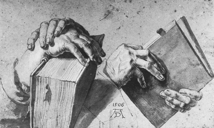 Zwei Paar Hände mit Buch